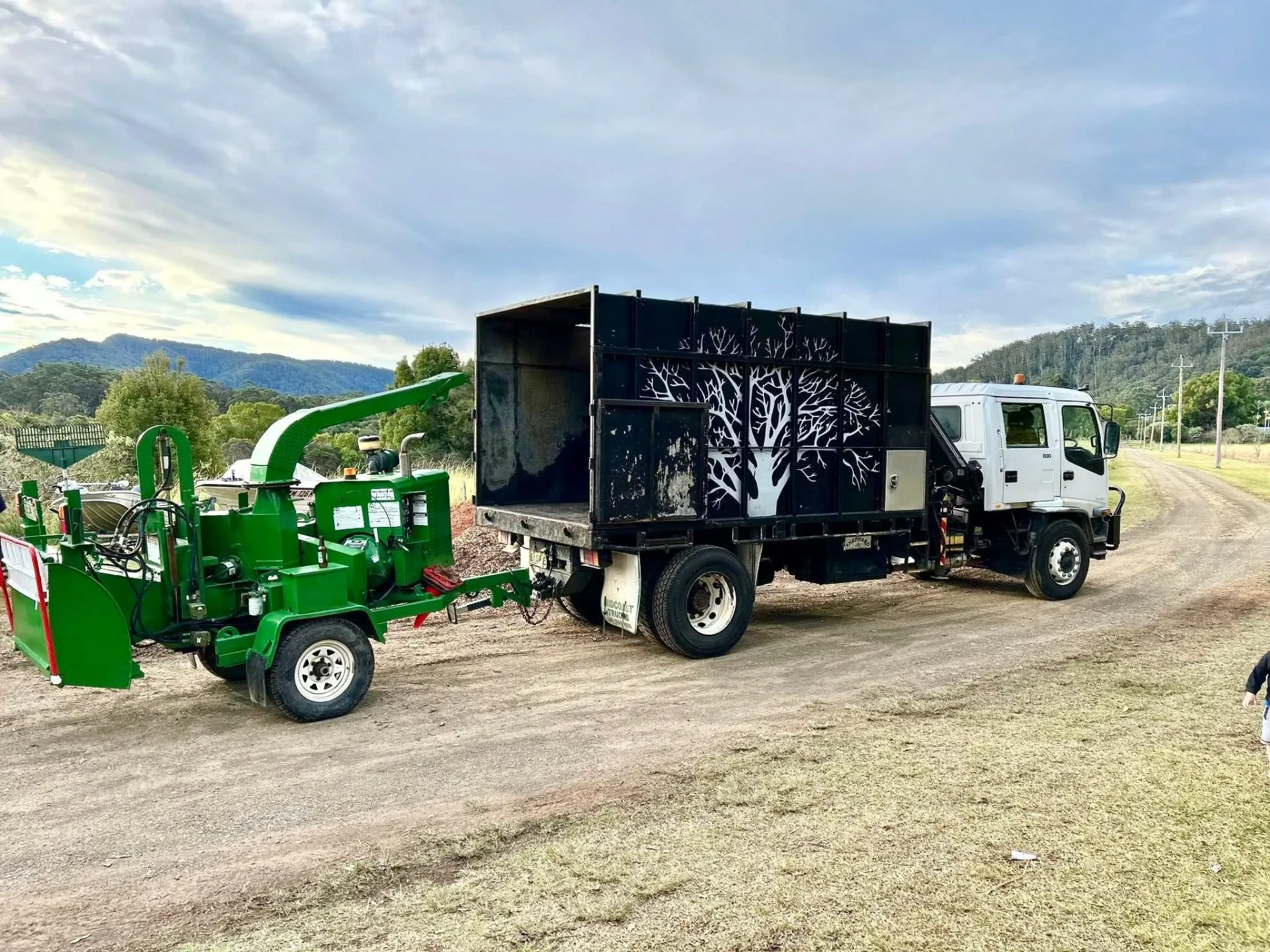 Manning Valley Tree Service truck and wood chipper on site